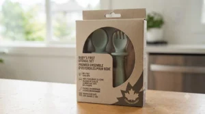 Eco-friendly retail packaging featuring English and French descriptions for certified safe baby utensils sold in Canada.