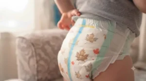 Close-up of a smart wetness indicator feature on high-performance disposable diapers for modern caregivers.