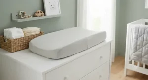 Secure fitted contoured changing pad cover designed for baby boy nursery essentials.
